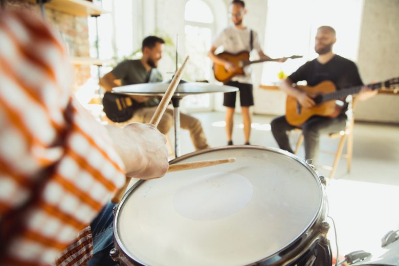 musician-band-jamming-together-art-workplace-with-instruments